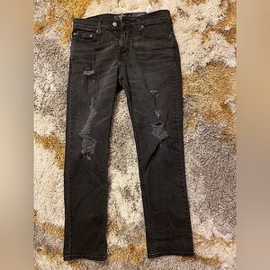 Black jeans from Hollister with grey rips. Never worn great condition. 29W-30W.